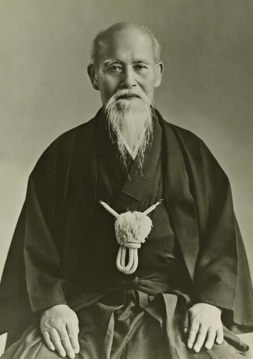 Formal seated portrait of Morihei Ueshiba